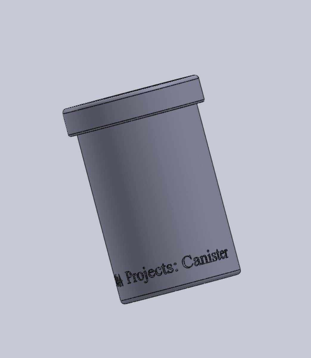 Film canister CAD render with the engraving text on the side