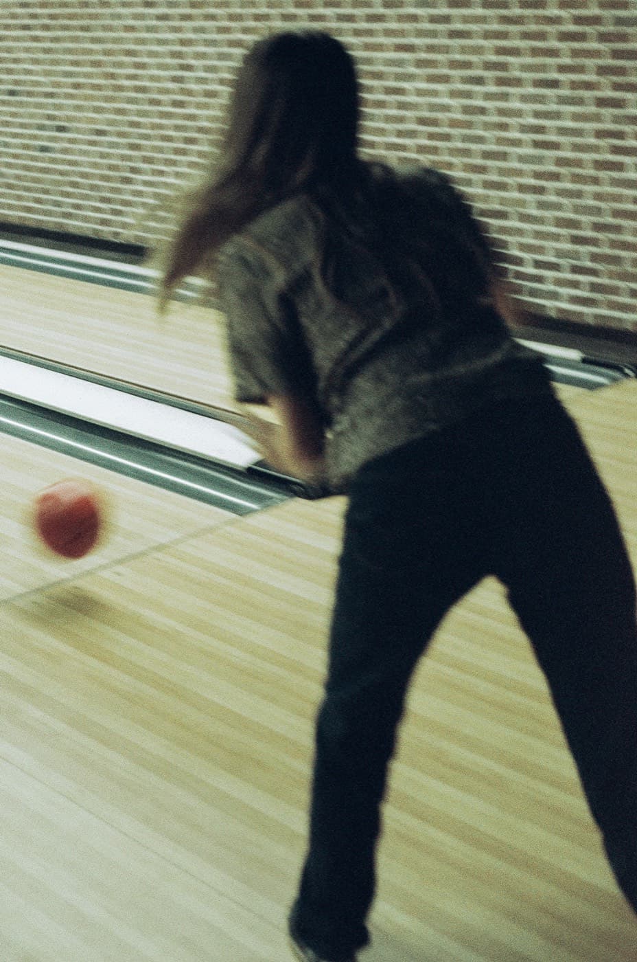 Bowler mid-throw, shot on 35mm