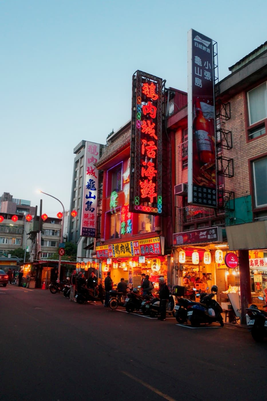 Neon street scene at dusk