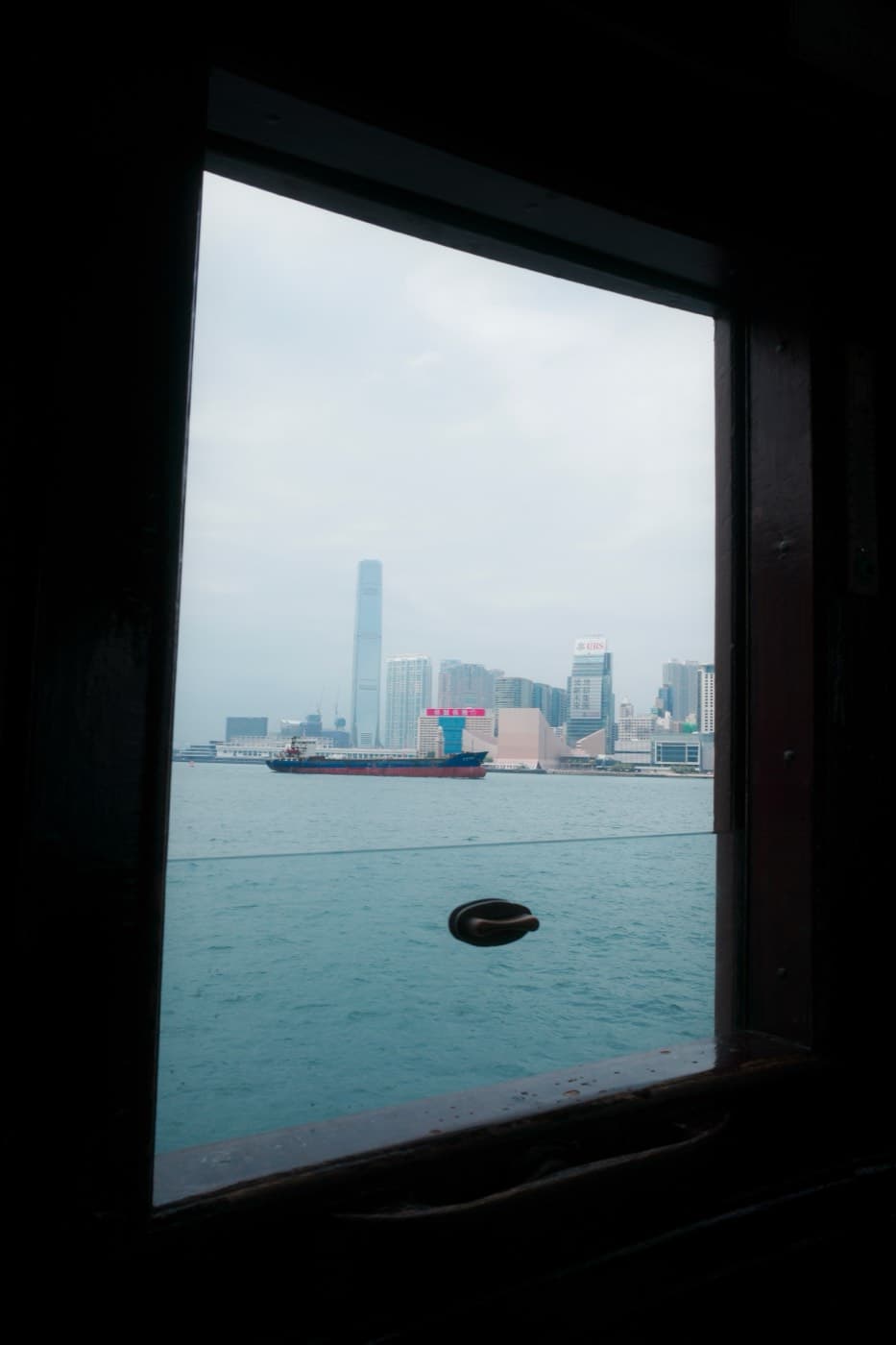 Harbor view through a ferry window